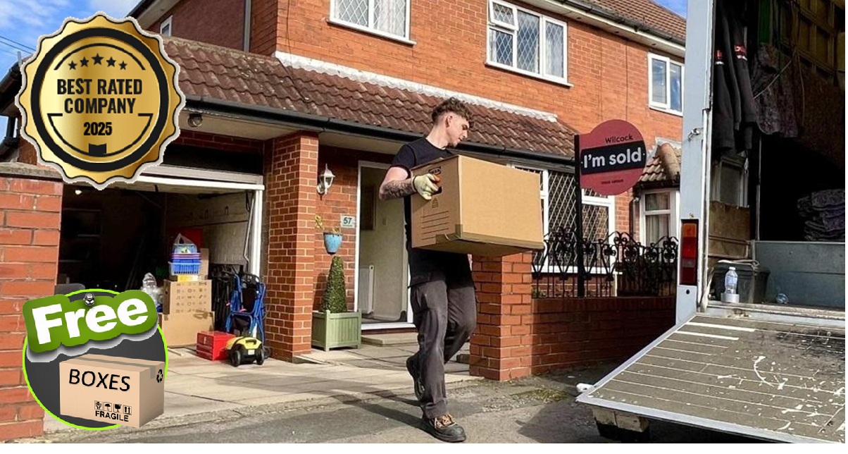 A uniformed White Glove Removals mover carefully carrying a packed box to the van outside a sold Yorkshire home